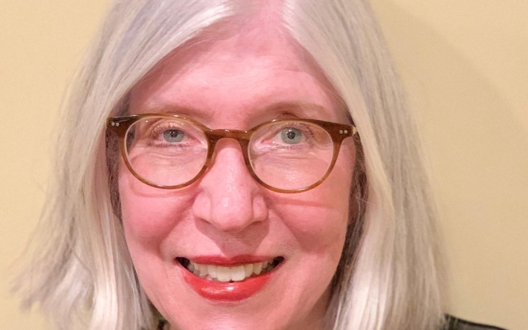 Suzanne Ross Schweppe, Secretary, sitting for a headshot