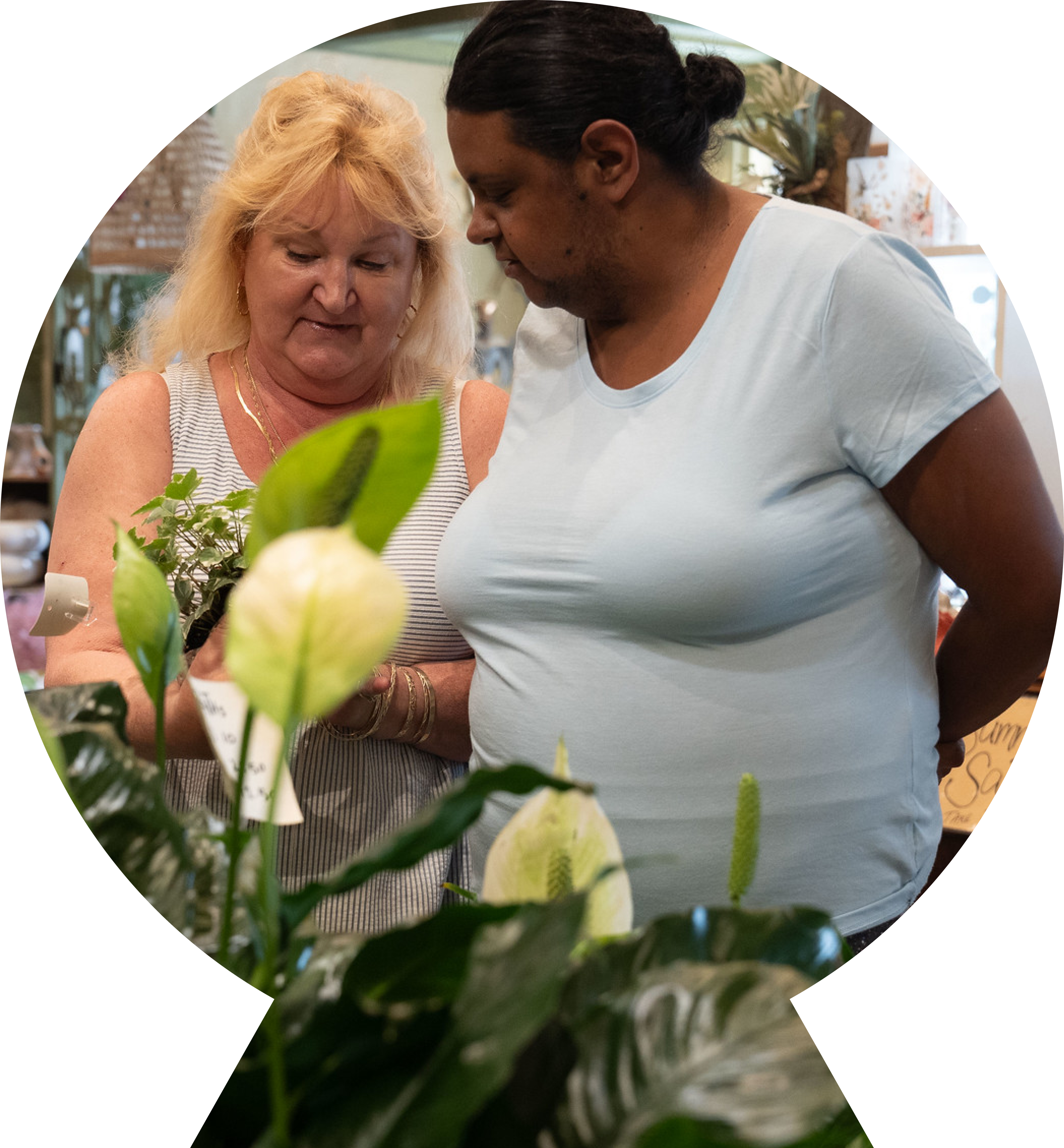 Friends shopping in a flower shop