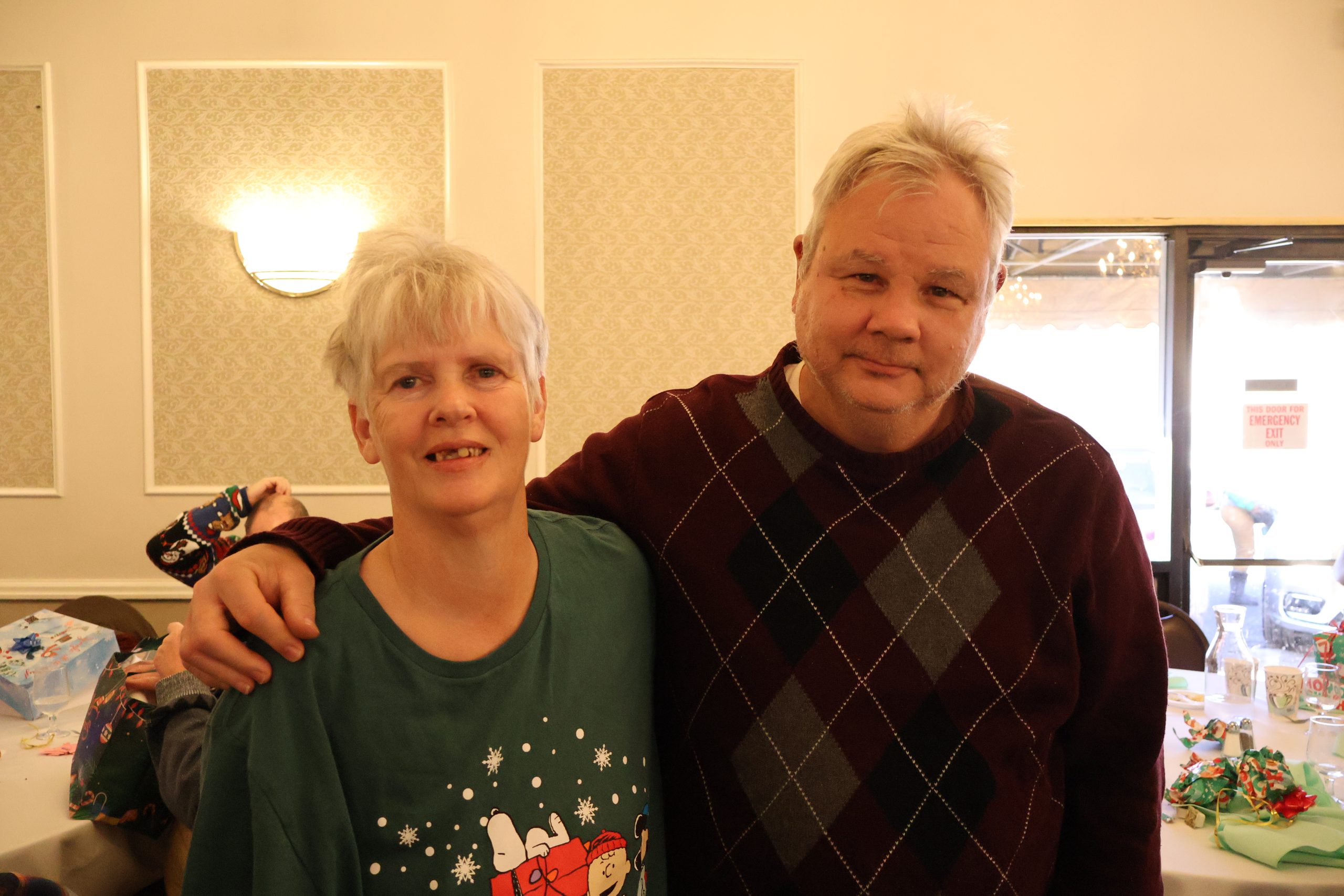 Julie and her boyfriend celebrating at a holiday party.