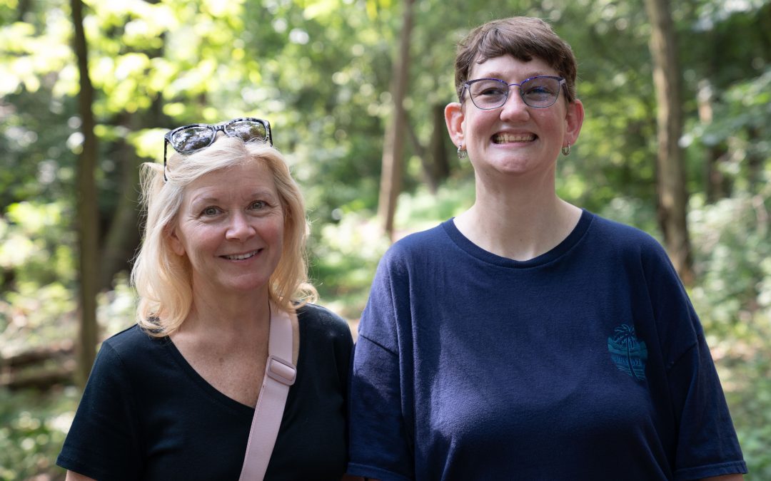 Helene and Renee with bright smiles while outside